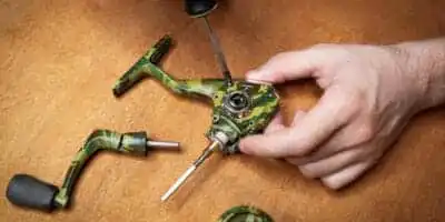 Pro-Grade Care: How to Extend the Lifespan of Your Fishing Gear 8 cut reel repair 1024x683 1